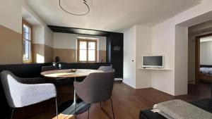 TV a/nebo společenská místnost v ubytování Apartment Cesa Collina Family Retreat