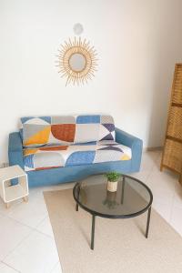 Posezení v ubytování Studio Cosy avec espace piscine à la villa Boucard