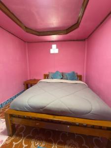 Giường trong phòng chung tại Danai Guesthouse