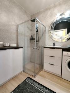 Ένα μπάνιο στο Apartament Osiedle Piano Park Suwałki +11 φωτογραφίες