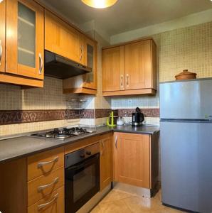 Kuchyň nebo kuchyňský kout v ubytování Welcome to your Stylish Atlas View Apartment