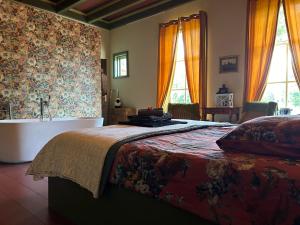 Giường trong phòng chung tại Landgoedboerderij Oosterheerdt