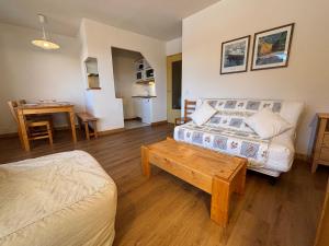 Ένα ή περισσότερα κρεβάτια σε δωμάτιο στο Résidence Saboia Clés Blanches