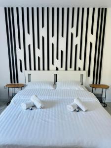 Ένα ή περισσότερα κρεβάτια σε δωμάτιο στο The W Villa