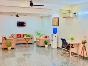 Et tv og/eller underholdning på Kora Royale Serviced Apartment + 14 billeder