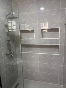 Ванная комната в Hugs Luxury Apartments