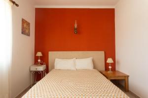 Ένα ή περισσότερα κρεβάτια σε δωμάτιο στο Casa Lusco Fusco