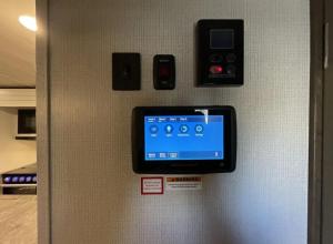 a wall with a device on a wall at Luxury Oceanfront Trailer Home Cerritos in San Carlos