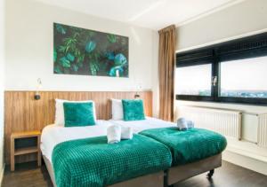 Postel nebo postele na pokoji v ubytování Hotel Wander