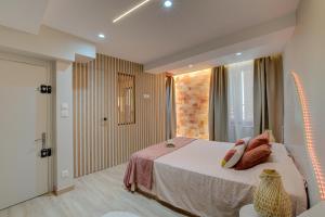 a bedroom with a bed with a vase on it at Serenity Suite in Bourgoin