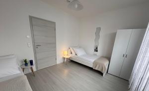 Postel nebo postele na pokoji v ubytování Sonnenblick Apartment