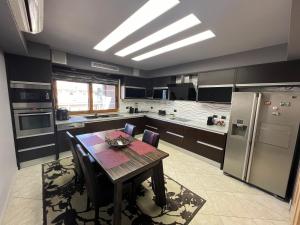 Køkken eller tekøkken på Manga Luxury Apartments - 2 Bedroom