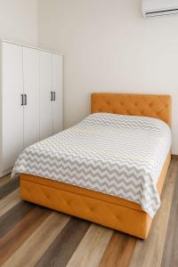 Giường trong phòng chung tại Sarajevo Center daily apartment - Walk everywhere - Old town