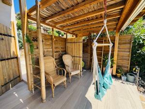 En terrasse eller udendørsområde på Maison dans Domaine avec piscine collective