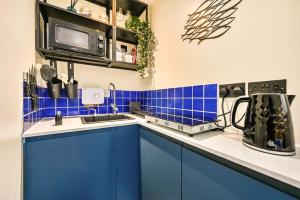 Η κουζίνα ή μικρή κουζίνα στο Stone's Throw