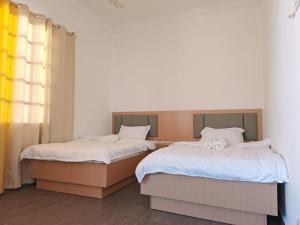 Ένα ή περισσότερα κρεβάτια σε δωμάτιο στο Bungalow House Sentul