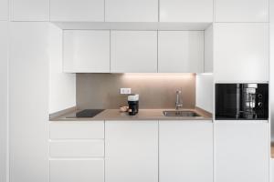 Kuchyň nebo kuchyňský kout v ubytování GuestReady - Cravo