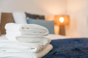 Postel nebo postele na pokoji v ubytování GuestReady - Cravo + 13 fotografií