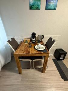 Posezení v ubytování NEON Apartements