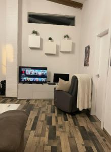 Μια τηλεόραση ή/και κέντρο ψυχαγωγίας στο Villa Eventos Biar - Private Pool