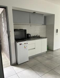 Η κουζίνα ή μικρή κουζίνα στο Monoambiente Hospital Italiano