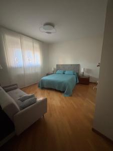 Кровать или кровати в номере Mater Domini