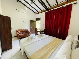 Ένα ή περισσότερα κρεβάτια σε δωμάτιο στο Chami's Home Stay +5 φωτογραφίες