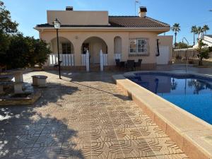 Swimmingpoolen hos eller tæt på Oasis del mar