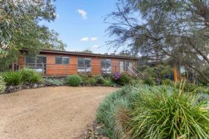 an exterior view of a house with a yard at Saltwater Shack in Anglesea