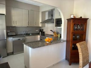 Køkken eller tekøkken på Oasis del mar