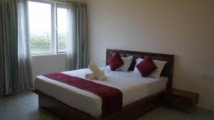 Postel nebo postele na pokoji v ubytování D D Luxury Inn