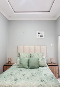 Ένα ή περισσότερα κρεβάτια σε δωμάτιο στο Chipangano Apartments