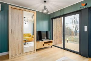 Et tv og/eller underholdning på Wilcza Osada Resort