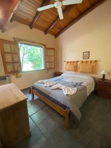 Postel nebo postele na pokoji v ubytování Complejo de cabañas en Nono