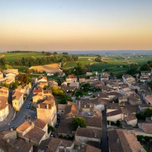 an aerial view of a small town with houses at Chambre d'Hotes La Roseraie in Parsac