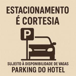 a sign for a parking lot with a car at Ville Celestine Hotel in Belo Horizonte
