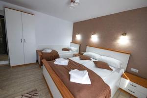 Postel nebo postele na pokoji v ubytování Casa Sofia Avrig + 25 fotografií