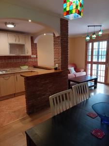 Η κουζίνα ή μικρή κουζίνα στο Apartamentos Scalera Cozy Inns