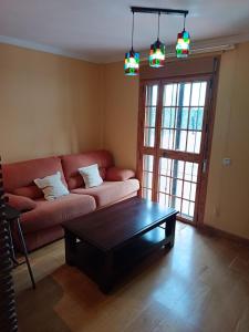 Ένα ή περισσότερα κρεβάτια σε δωμάτιο στο Apartamentos Scalera Cozy Inns