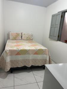 Ένα ή περισσότερα κρεβάτια σε δωμάτιο στο Casa Urbis