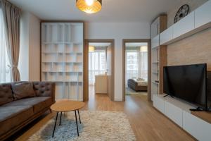 Et tv og/eller underholdning på Class Residence 24 Premium 2BR Apartment