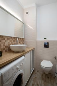 Et badeværelse på Class Residence 24 Premium 2BR Apartment + 27 billeder