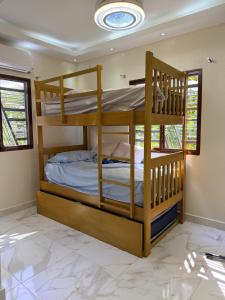 Postel nebo postele na pokoji v ubytování Villa Rafael