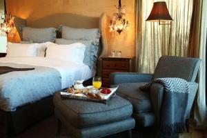 Postel nebo postele na pokoji v ubytování Casas Do Coro