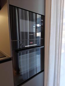 Kuchyň nebo kuchyňský kout v ubytování Bijelić Luxury Apartment with Jacuzzi