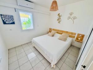 Fotografie z fotogalerie ubytování Appartement paradisiaque les pieds dans l'eau v destinaci Le Gosier