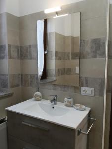 Koupelna v ubytování Casa vacanza P&G + 80 fotografií