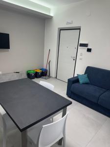 Μια τηλεόραση ή/και κέντρο ψυχαγωγίας στο Levante Casa Vacanze +7 φωτογραφίες