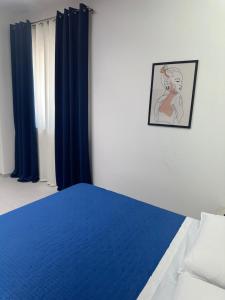 Ένα ή περισσότερα κρεβάτια σε δωμάτιο στο Levante Casa Vacanze