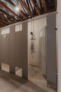 a row of doors in a room with a ceiling at Glamping yurt at a nature retreat Sequoia Highland in Miramonte +37 photos
